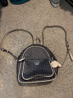 Guess Tan Monogram Backpack with Silver Chain Accent GUESS Backpack Brown Bags & Handbags for Women for sale | eBay main image 3